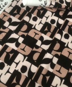 French Terry Buchstaben in schwarz auf altrosa Farbtönen 1