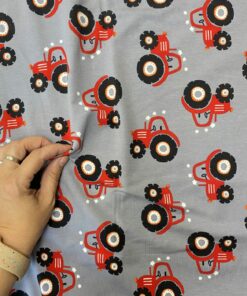 Baumwolljersey  roter Traktor auf dunkelgrau